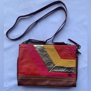 The Sak genuine leather cross body purse handbag with adjustable strap